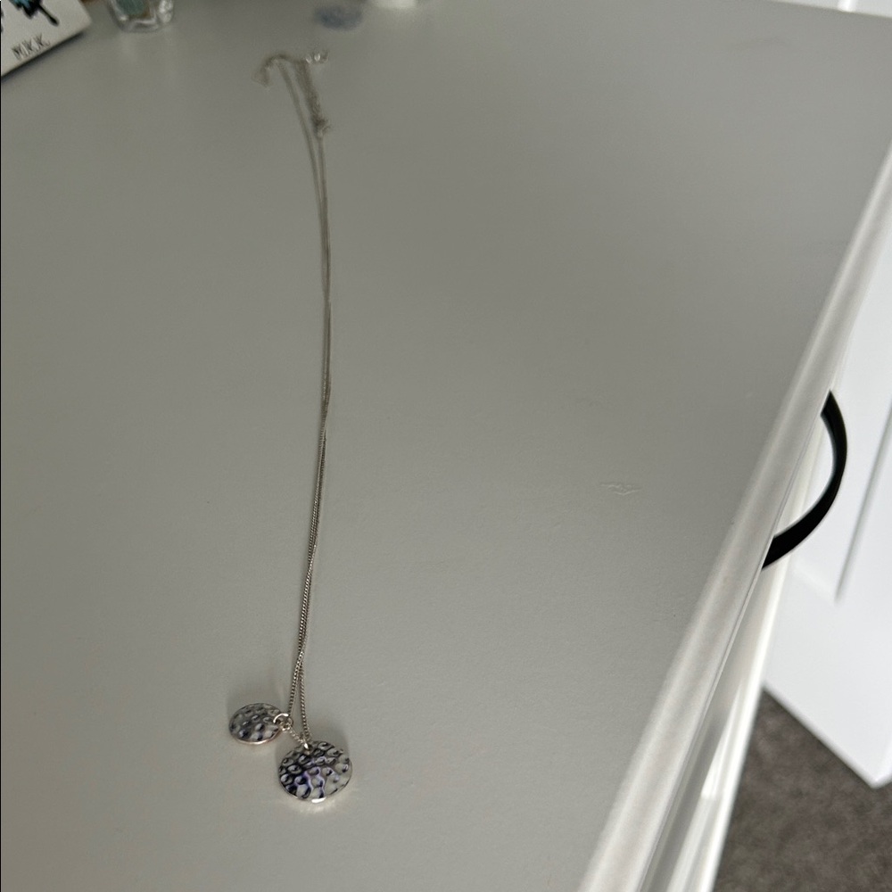 Elegant Silver Necklace with Purple Accents
